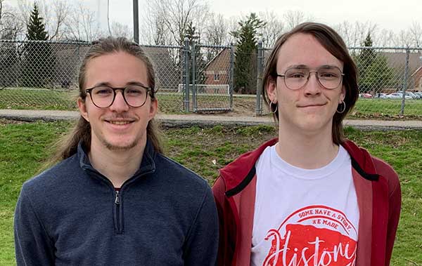 Two Students standing outside