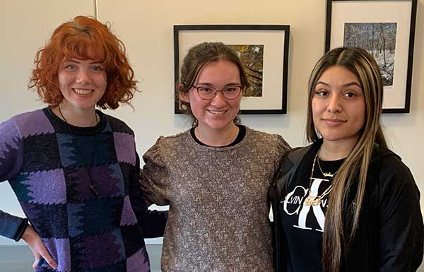 Three students posing togehter