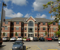 Parking lot in front of one of the Aquinas apartment buildings