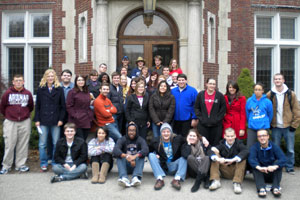 group photo of people in front of a building