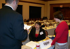 people standing around a table